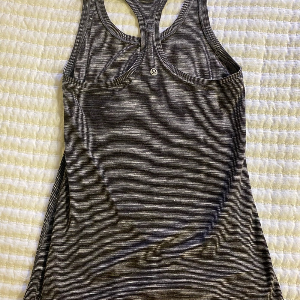 Black and white Lululemon running shirt.